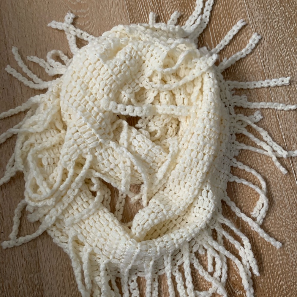 Cream infinity scarf with fringe detail